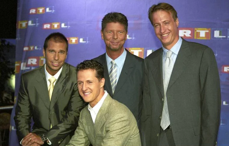 Kai Ebel, Michael Schumacher, Heiko Wasser und Florian König im August 2000 auf der Telemesse in Düsseldorf