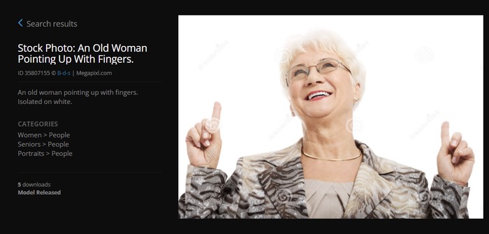 Stock Photo: An Old Woman Pointing Up With Fingers