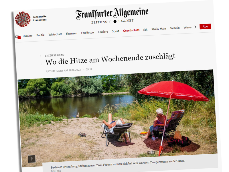 Bild-Text-Schere: Unter der Überschrift "Wo die Hitze am Wochenende zuschlägt" sieht man zwei Frauen, die sich entspannt am Flussufer sonnen