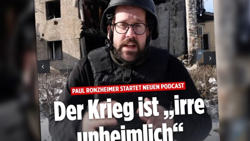 Screenshot eines „Bild“-Anreißers, auf dem Paul Ronzheimer mit Helm zu sehen ist. Überschrift: „Der Krieg ist ,irre unheimlich‘“