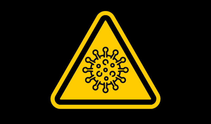 Gelbes Warnschild mit einem Corna-Virus.