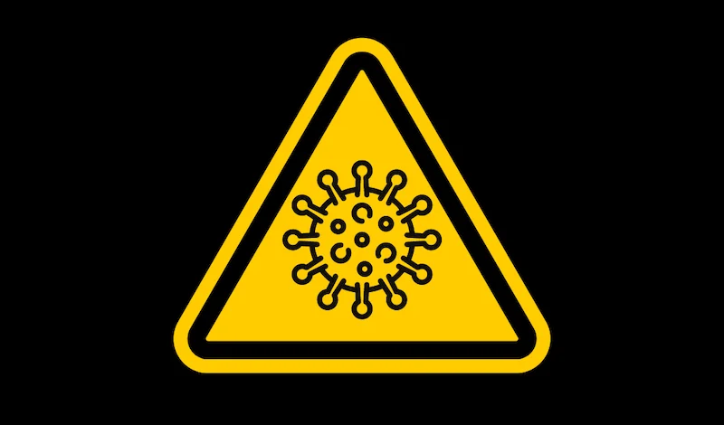 Gelbes Warnschild mit einem Corna-Virus.