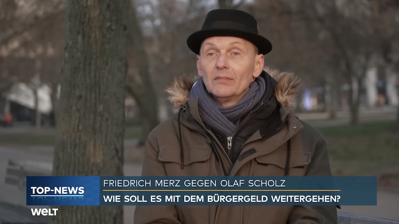 "Bürgergeld-Frank" im Einspieler zum Kanzlerduell bei Welt TV