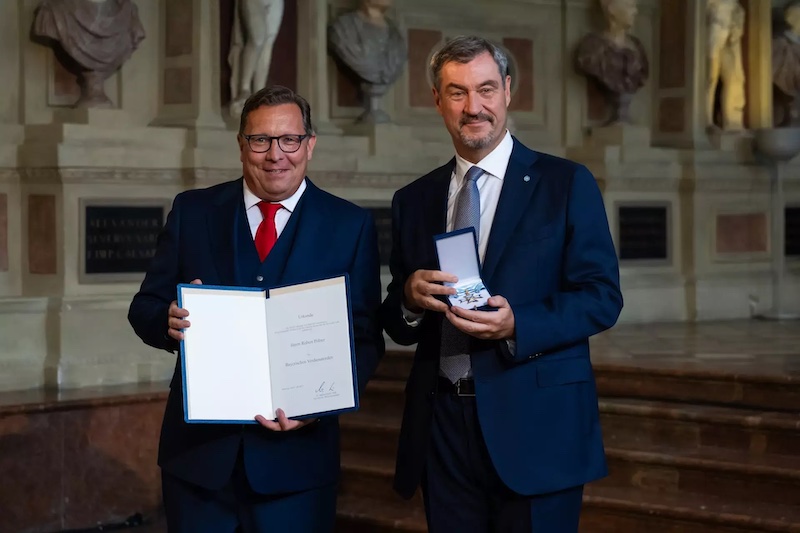 "Bunte"-Chefredakteur Robert Pölzer neben Markus Söder