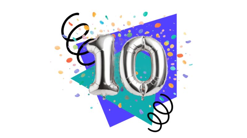 Die Zahl 10 als Luftballons mit Konfetti.