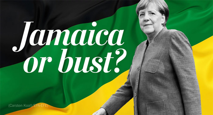 Angela Merkel vor einer schwarz-grün-gelben Flagge